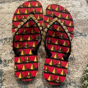 christian louboutin flip flops, never been worn, size 10 men, red pyramid